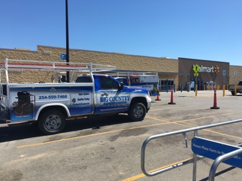 Big Country Plumbing truck on a commercial job site